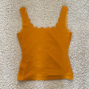 Scallop trimmed top.